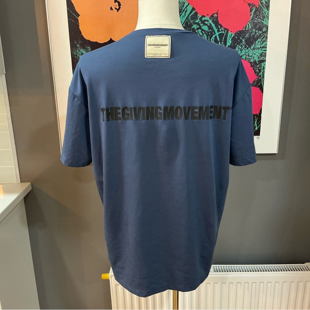The Giving Movement shirt UAE sustainability made
